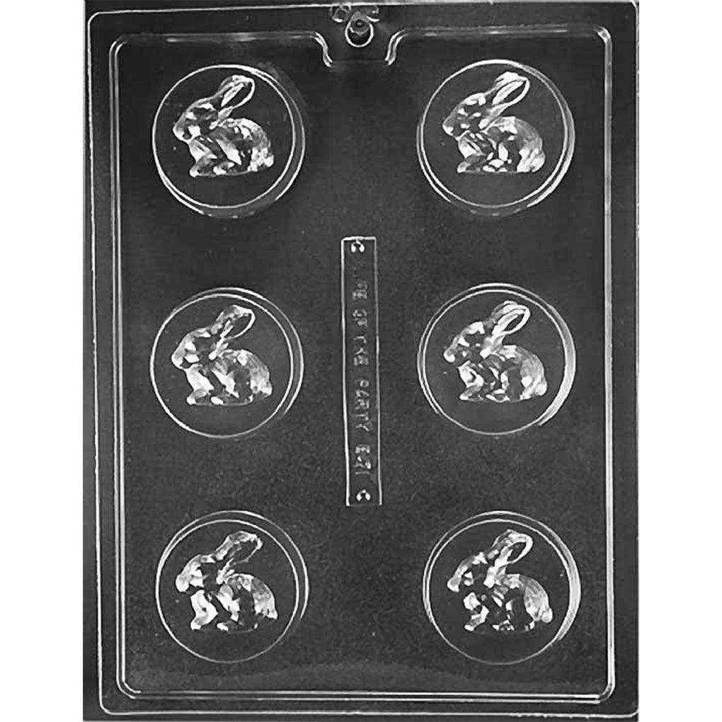Clear Bunny Rabbit Chocolate Covered Oreo Mold photographed against a black background with 6 round sandwich cookie cavities featuring a raised seated bunny design.