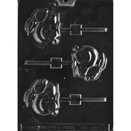 Clear plastic bunny chocolate lollipop mold with three bunny face cavities featuring round ears and a simple smiling expression, each connected to a lollipop stick channel.