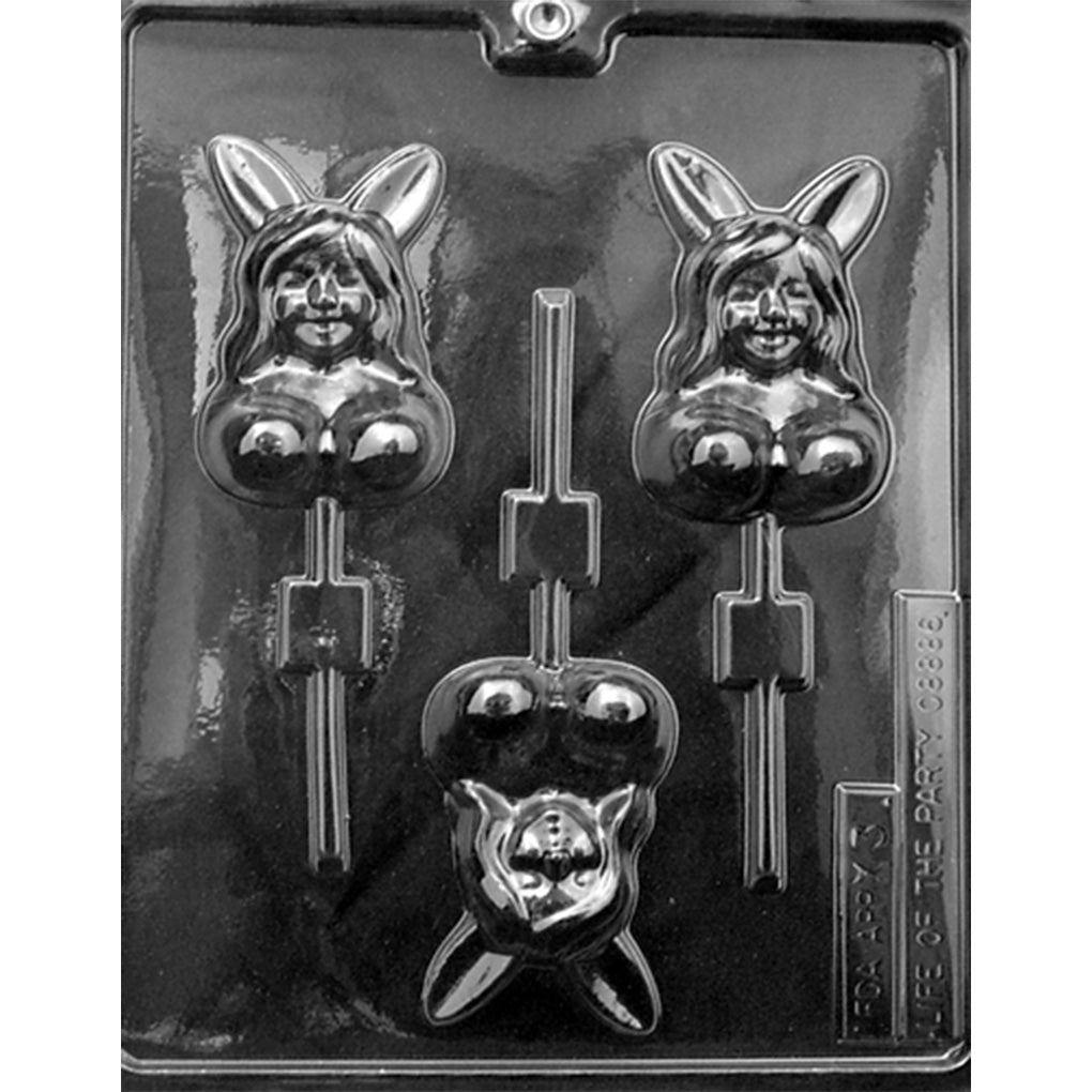Clear Topless Lady with Bunny Ears Chocolate Lollipop Mold photographed against a dark background, showing three cavities of a topless woman with long bunny ears, hair, facial features, and lollipop stick channels.