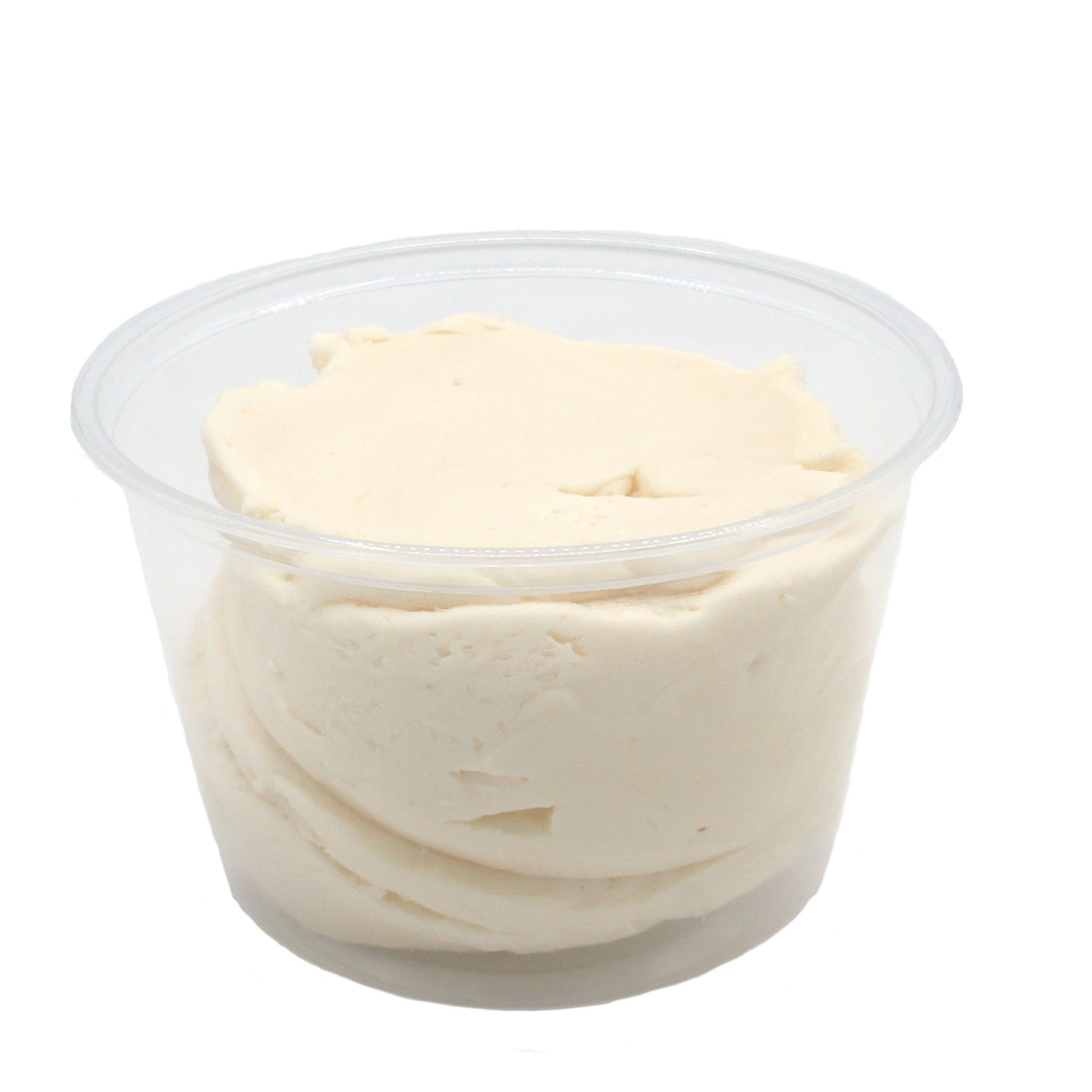 Clear plastic container filled with creamy buttercream candy center for making chocolates.