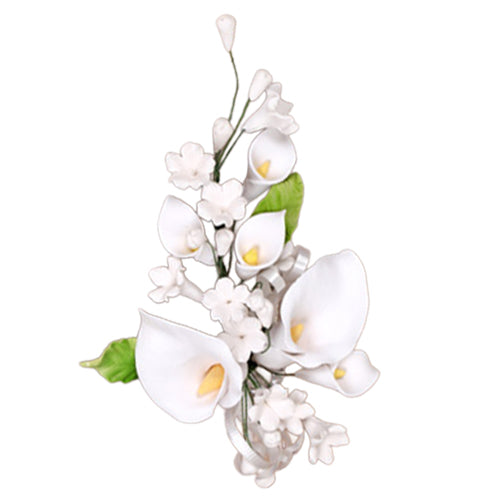 White gum paste calla lily spray with small blossoms and green leaves, 6 1/2 inches, for cake decorating.