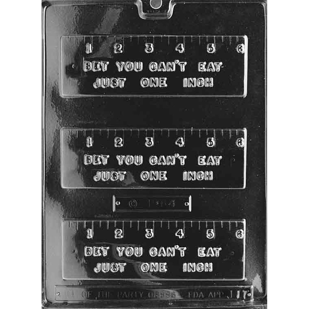 Clear “Bet You Can’t Eat Just One Inch” Ruler Chocolate Mold photographed against a black background with three rectangular ruler cavities featuring raised 1–6 inch markings and lettering.