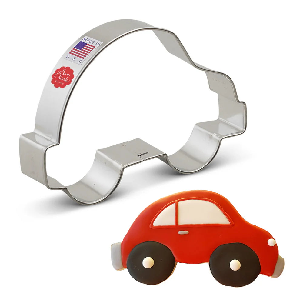 Car Cookie Cutter displayed with a decorated red car-shaped cookie featuring black wheels and white windows.