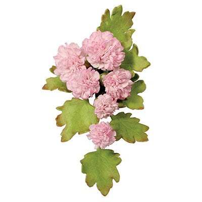Pink carnation flowers with green leaves made from fondant or gumpaste, arranged for cake decorating or edible crafts.