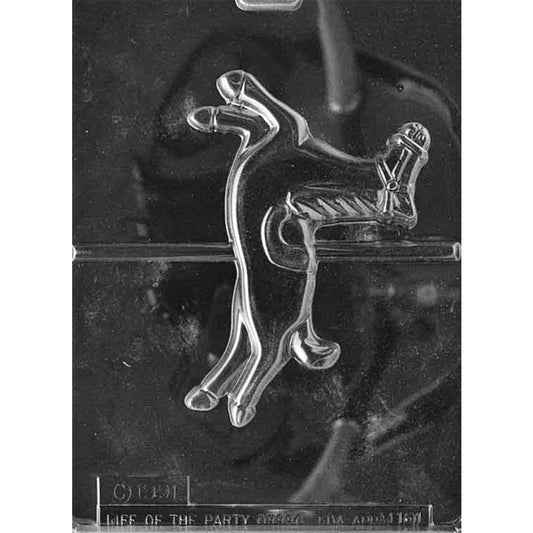 Clear Large Carousel Horse Chocolate Mold photographed against a black background with one detailed prancing horse cavity featuring a mane, saddle, harness, and raised leg.