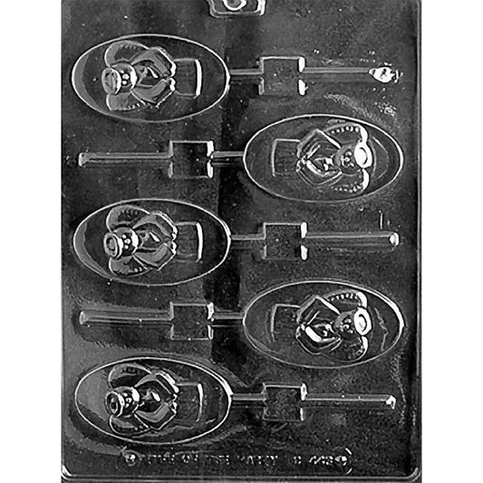 Clear plastic chocolate lollipop mold with six oval cavities showing a cartoon angel with a halo and a raised heart on its chest, with attached stick channels; shown on a dark background.