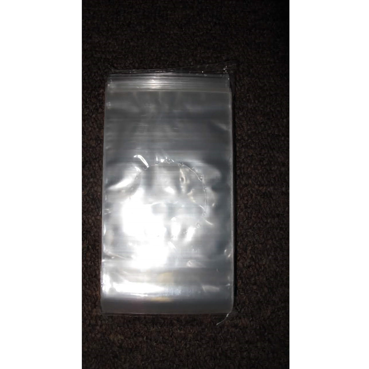 Stack of 100 clear 3 x 5 1/2-inch polypropylene cello-style bags for chocolate suckers