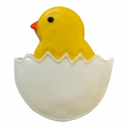 Decorated chick in egg cookie with a bright yellow chick emerging from a white eggshell.