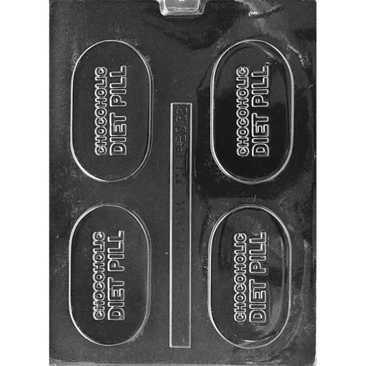 Clear plastic chocolate mold photographed on a black background with four pill-shaped cavities, each embossed with raised “Chocoholic Diet Pill” lettering.