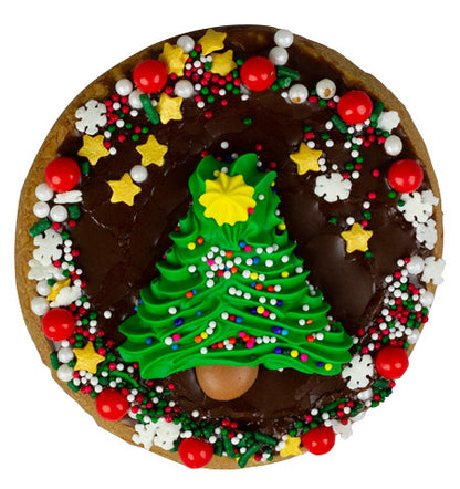 Chocolate-covered cookie decorated with festive sprinkles and topped with a royal icing Christmas tree featuring a yellow star and rainbow non-pareils.