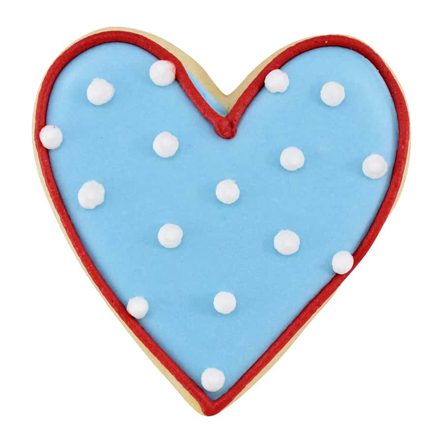 Decorated heart-shaped cookie with light blue icing, red trim, and white polka dots.