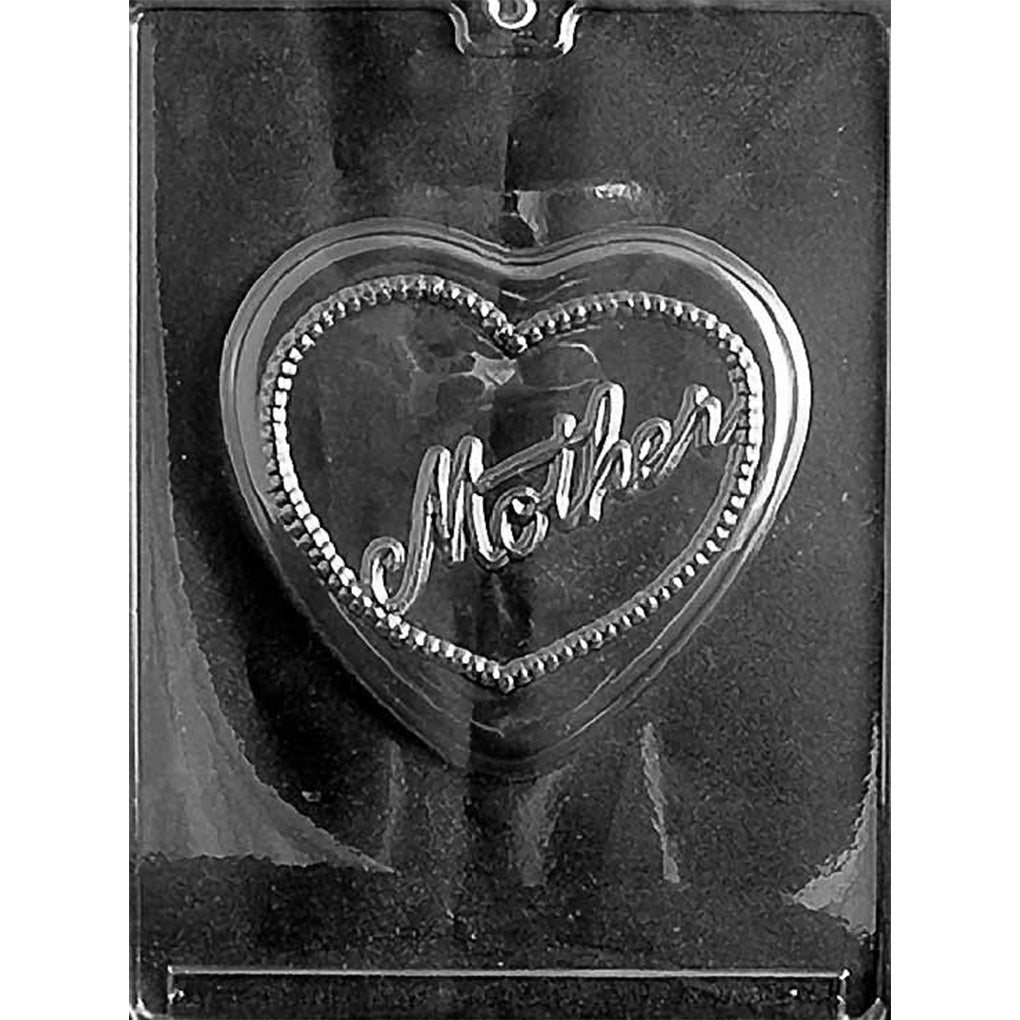 Clear plastic chocolate mold with one large heart-shaped cavity featuring the word “Mother” in raised script and a beaded pearl-style border, shown on a dark background.