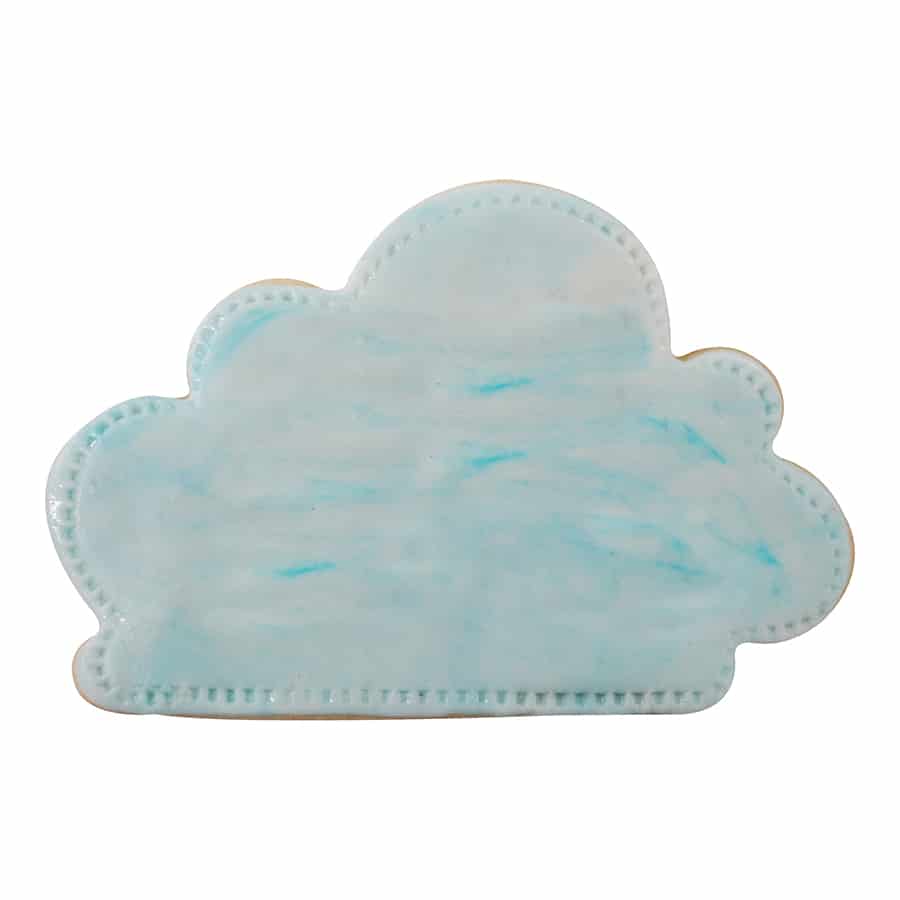 Decorated cloud cookie with soft blue watercolor-style icing.