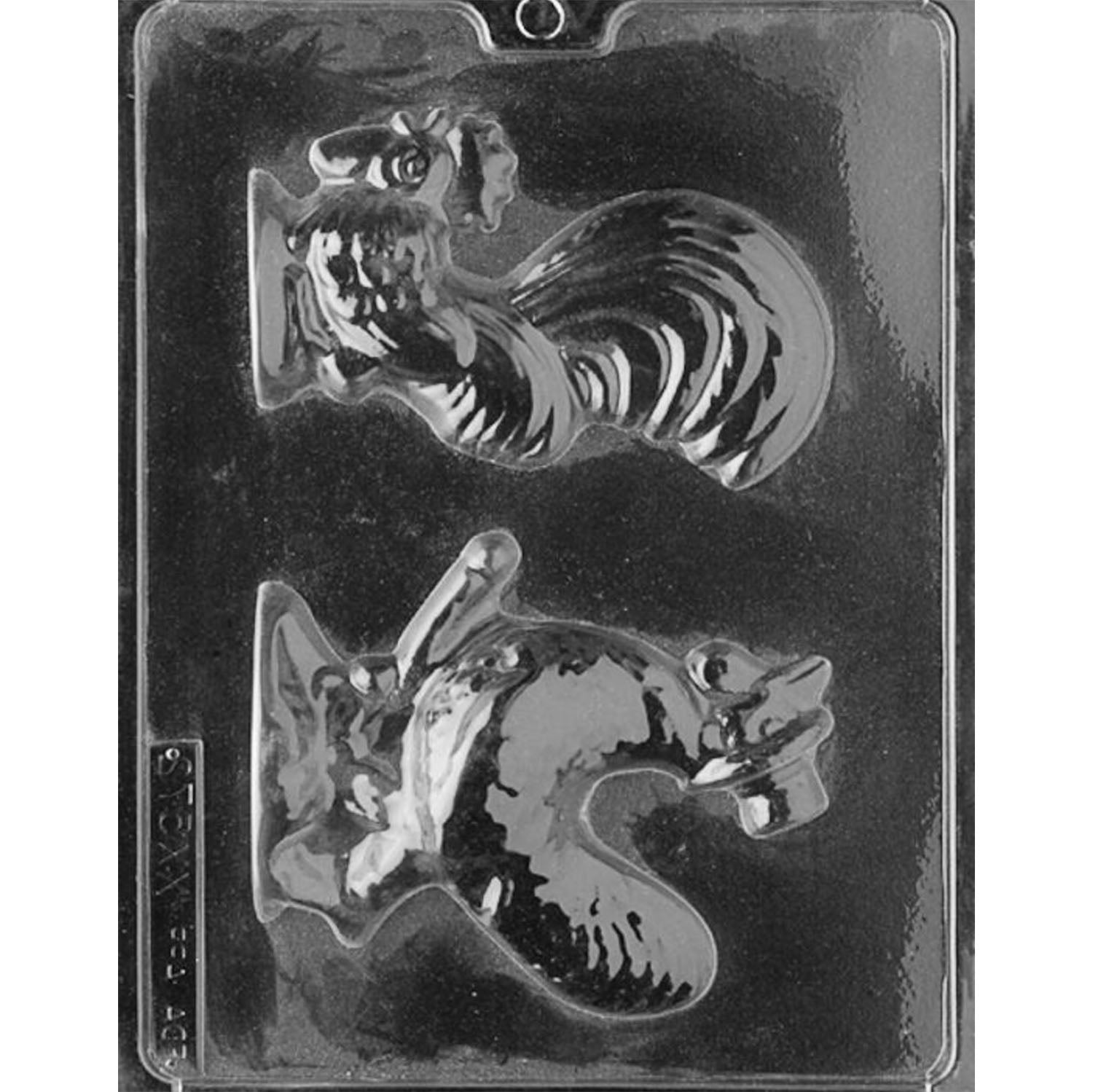 Clear Cock-a-Doodle-Do Chocolate Mold photographed against a black background, featuring two novelty rooster cavities, one with exaggerated male anatomy and one in a suggestive bent-over pose.