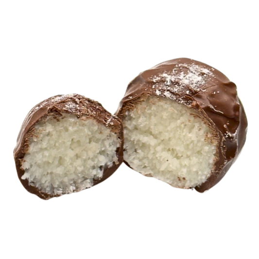 Chocolate-dipped coconut ball cut in half on a white background