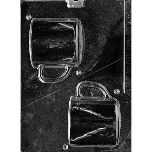 Clear plastic 3D chocolate mold with two coffee mug-shaped cavities showing a cup profile and handle, designed to be cut and assembled into a full 3D mug, on a dark background.