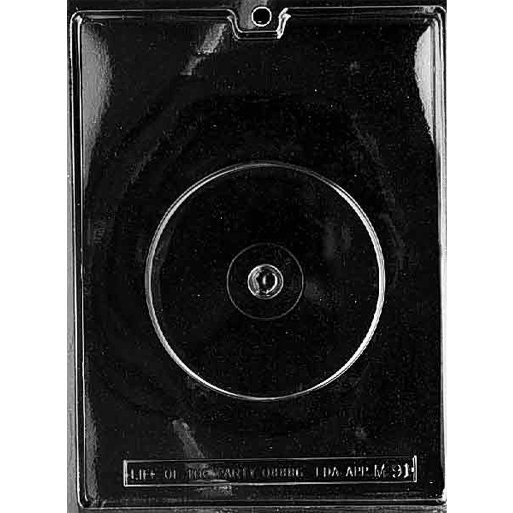 Clear Compact Disk Chocolate Mold photographed against a black background with one large round compact disc cavity and center hole detail.
