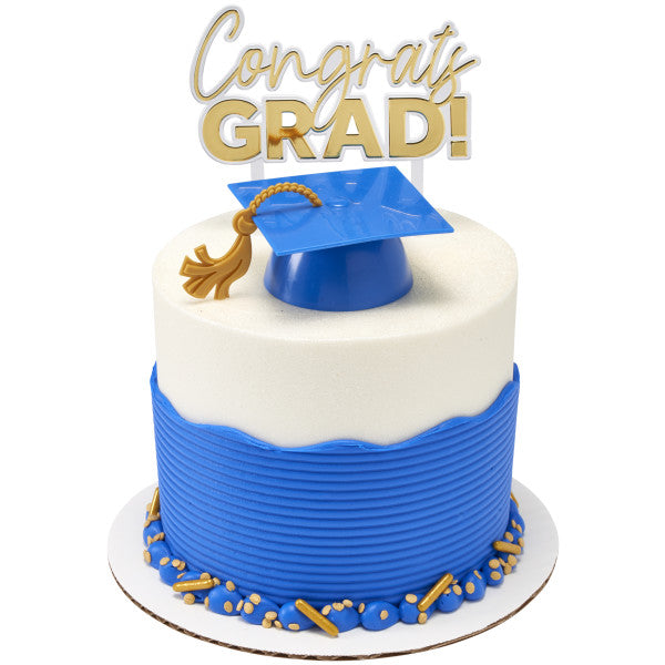 Graduation cake with blue cap and gold "Congrats GRAD!" topper, ideal for college or high school parties