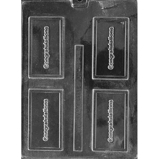 Clear plastic chocolate bar mold photographed on a black background with four rectangular cavities, each embossed with raised “Congratulations” text inside a thin border.