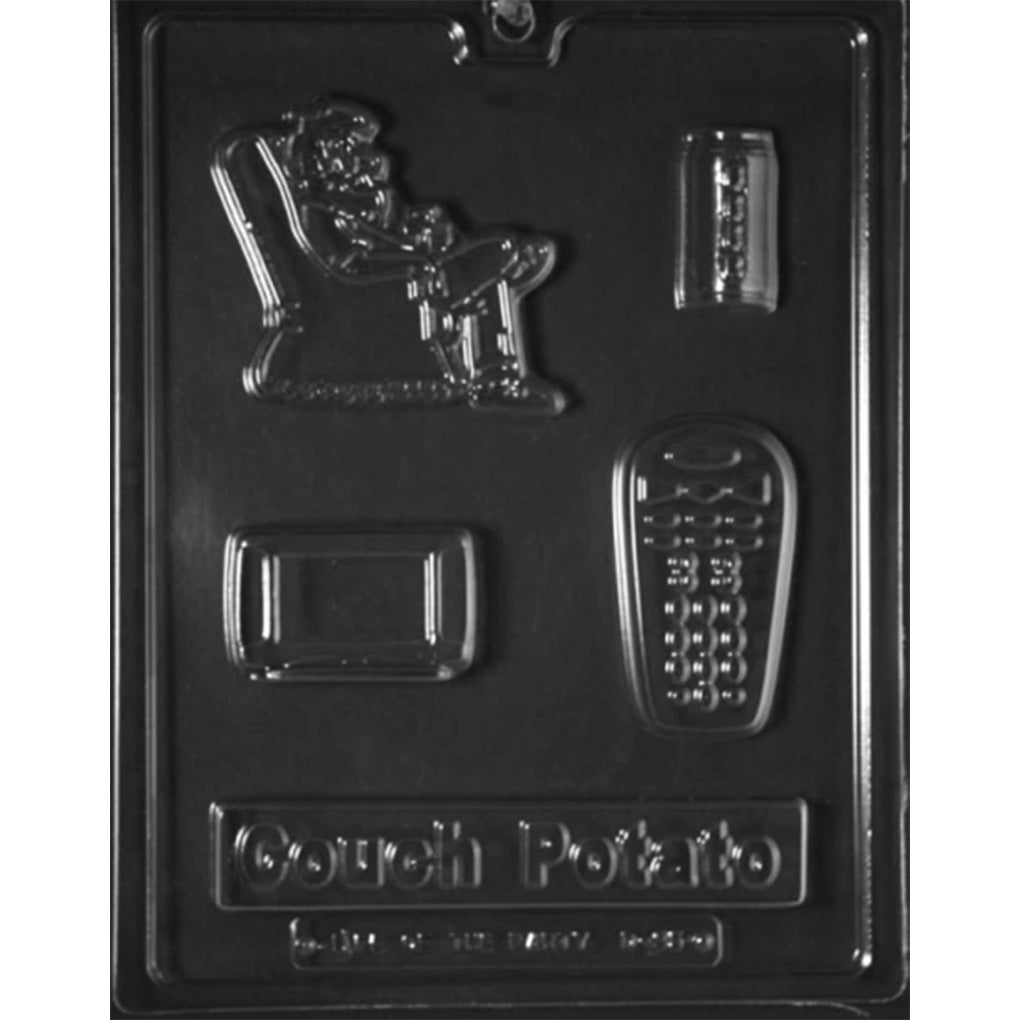Clear plastic chocolate mold with cavities shaped like a lounging person in a recliner, a remote control, a television, a beverage can, and a plaque reading “Couch Potato,” shown on a dark background.