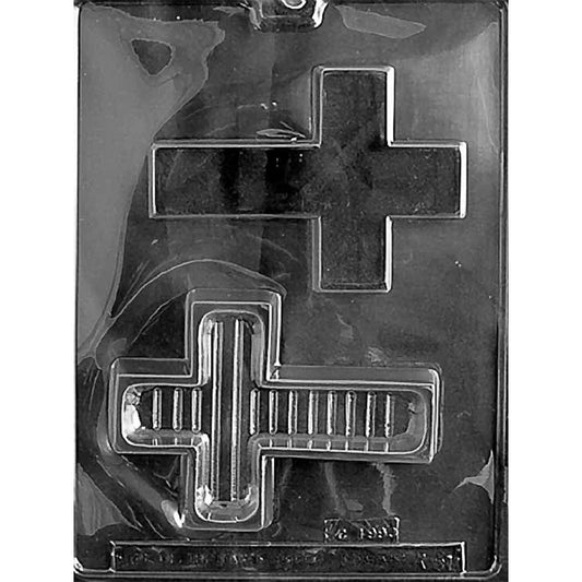 Clear plastic chocolate mold with two cross-shaped cavities, one deep cross base for a pour box and one matching cross lid cavity for making a fillable chocolate cross box.