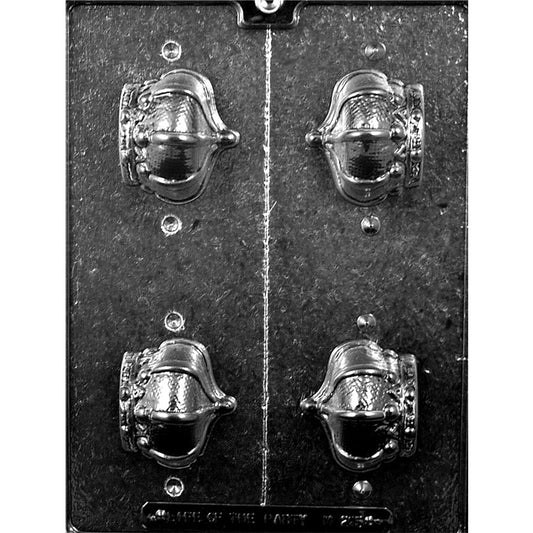 Clear plastic 3D chocolate mold with four crown-shaped cavities and a vertical cut line down the center for separating into two halves to form three-dimensional crowns.