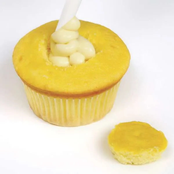 Cupcake with filling piped inside and top removed.