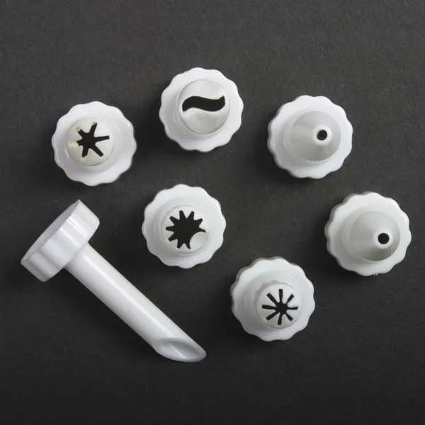 Close-up of assorted plastic decorating tips for cupcake injector.