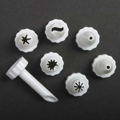 Close-up of assorted plastic decorating tips for cupcake injector.