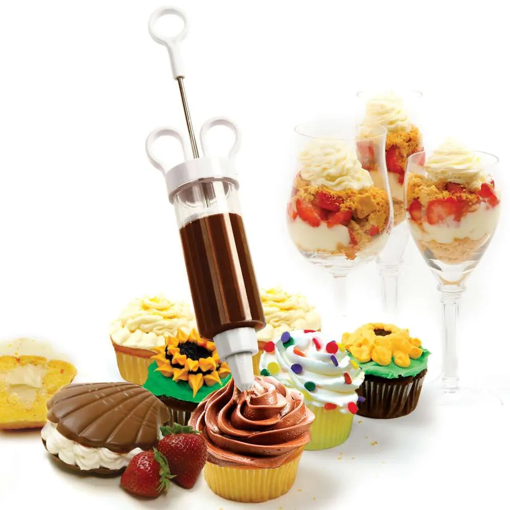 Cupcake injector piping chocolate frosting onto cupcakes with parfaits in the background.