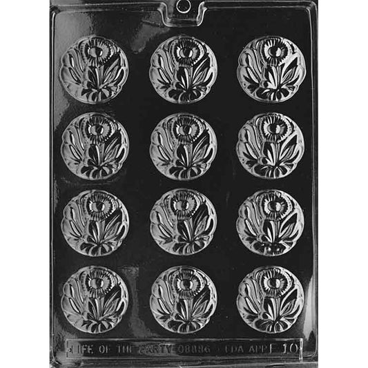 Clear plastic chocolate mold with twelve round cavities, each featuring a daisy-style flower pattern with petals and leaves.