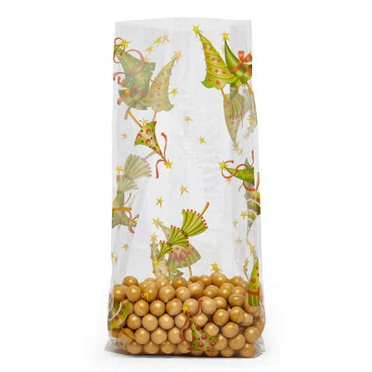 Clear gusseted cellophane treat bag printed with green cartoon Christmas trees and small gold stars, shown standing upright with gold candy balls at the bottom.