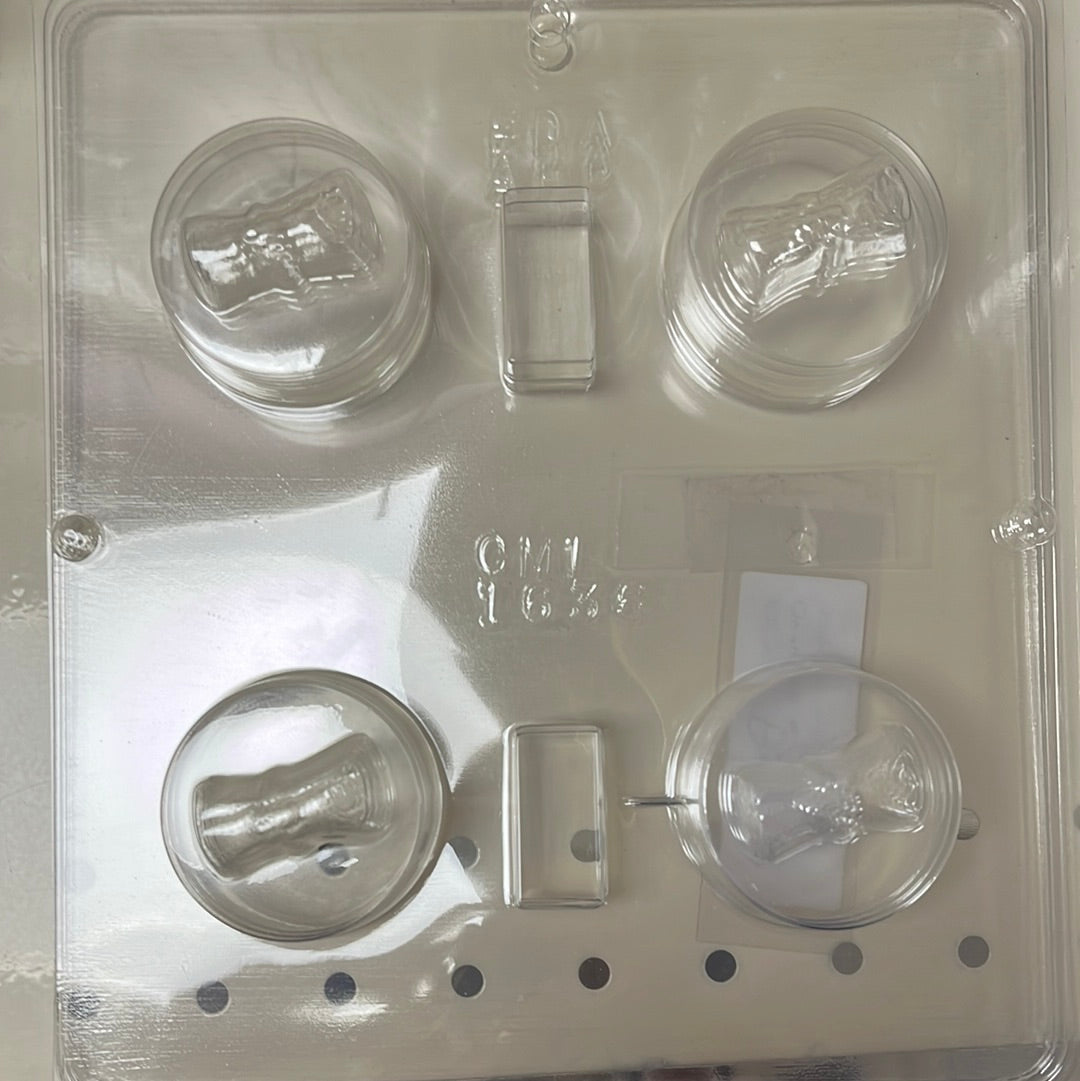 Clear plastic chocolate mold for making diploma-shaped chocolate covered oreos.