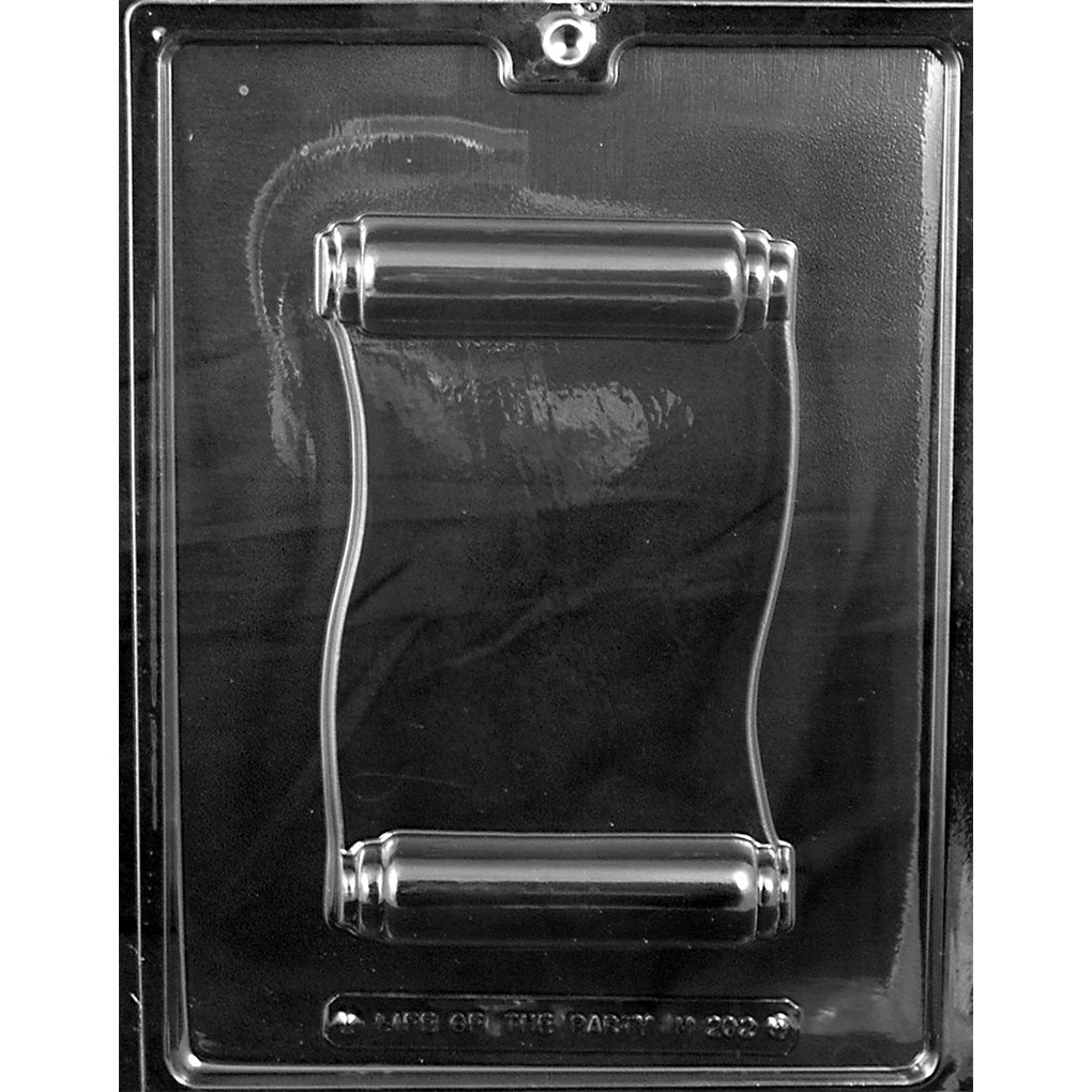 Clear plastic chocolate mold with one large scroll cavity featuring rolled ends and a curved parchment center panel, shown on a dark background.