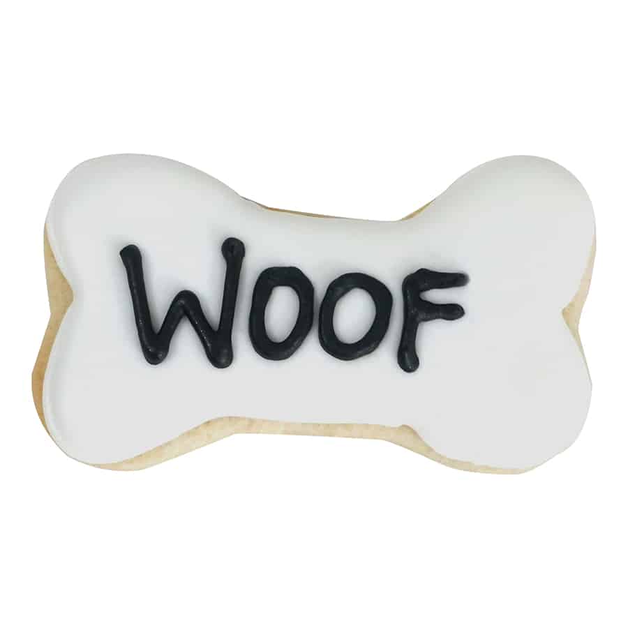 Decorated dog bone cookie with white icing and "Woof" written in black.