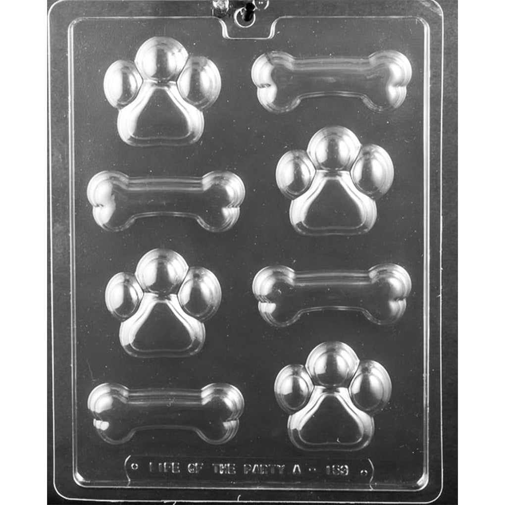 Dog bones and paws chocolate mold with eight cavities—four 2¼-inch paw prints and four 3⅛-inch dog bones, all 7/16 inch deep