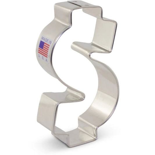 Silver dollar sign-shaped cookie cutter with "Made in USA" label.