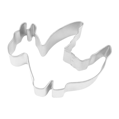 Overhead view of a dragon-shaped metal cookie cutter.