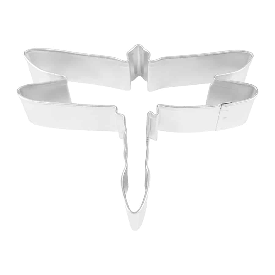 Silver dragonfly-shaped cookie cutter, 4 inches wide and 3.25 inches tall, made from durable steel.