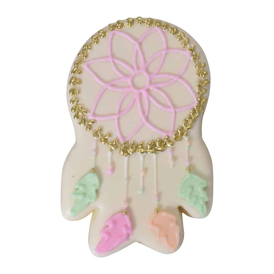 Decorated dream catcher cookie with pastel feathers, gold detailing, and intricate icing webbing.