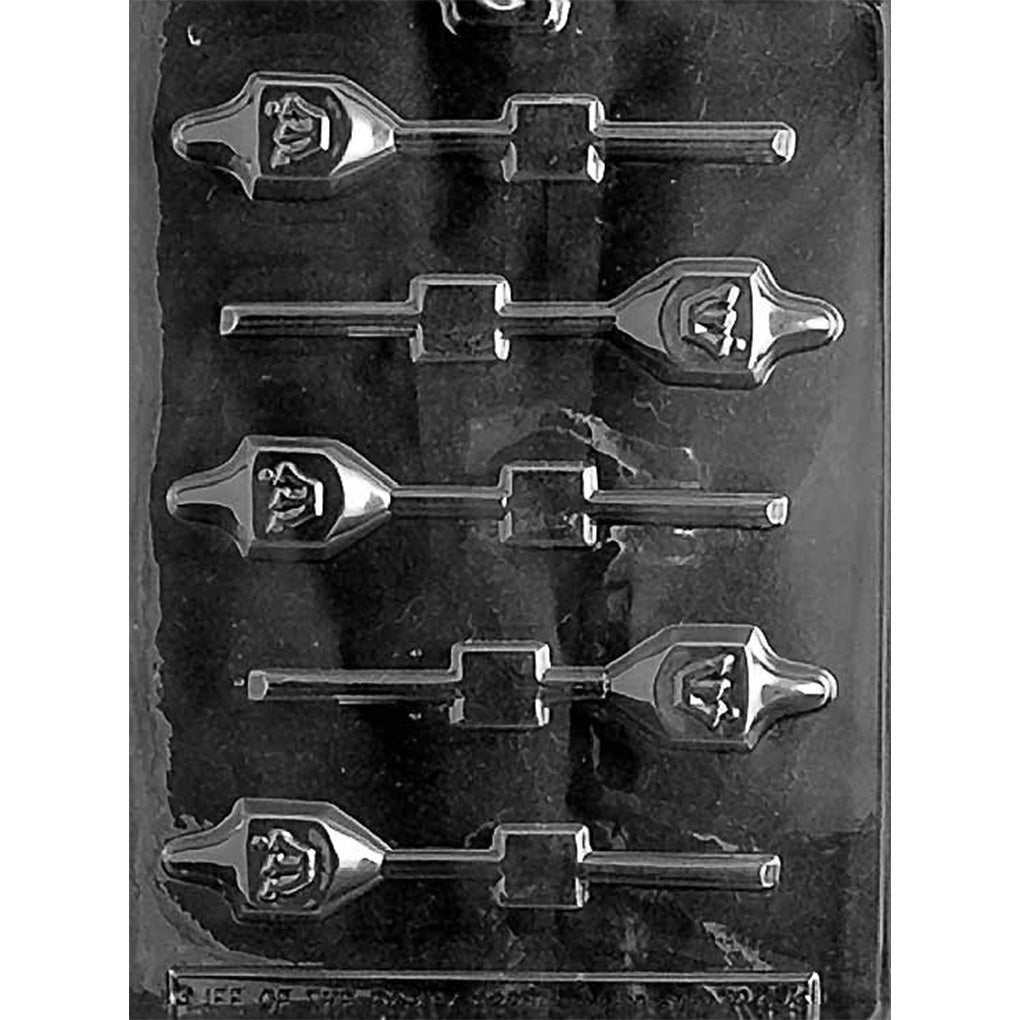 Plastic chocolate lollipop mold with small dreidel-shaped cavities and stick channels, designed for making Hanukkah-themed chocolate pops.