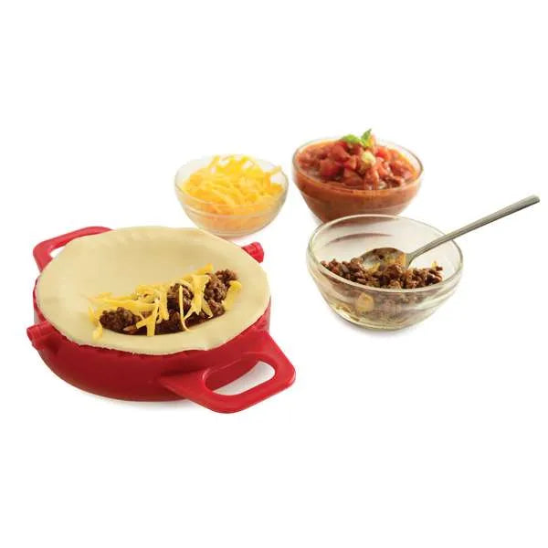 Dumpling press with filling ingredients—cheese, ground meat, and salsa—prepared beside it.