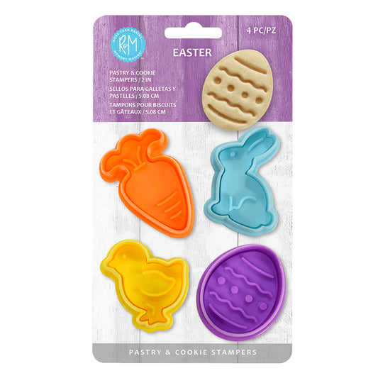 Easter-themed cookie stampers in packaging, featuring four colorful stampers shaped like a carrot, bunny, chick, and egg.