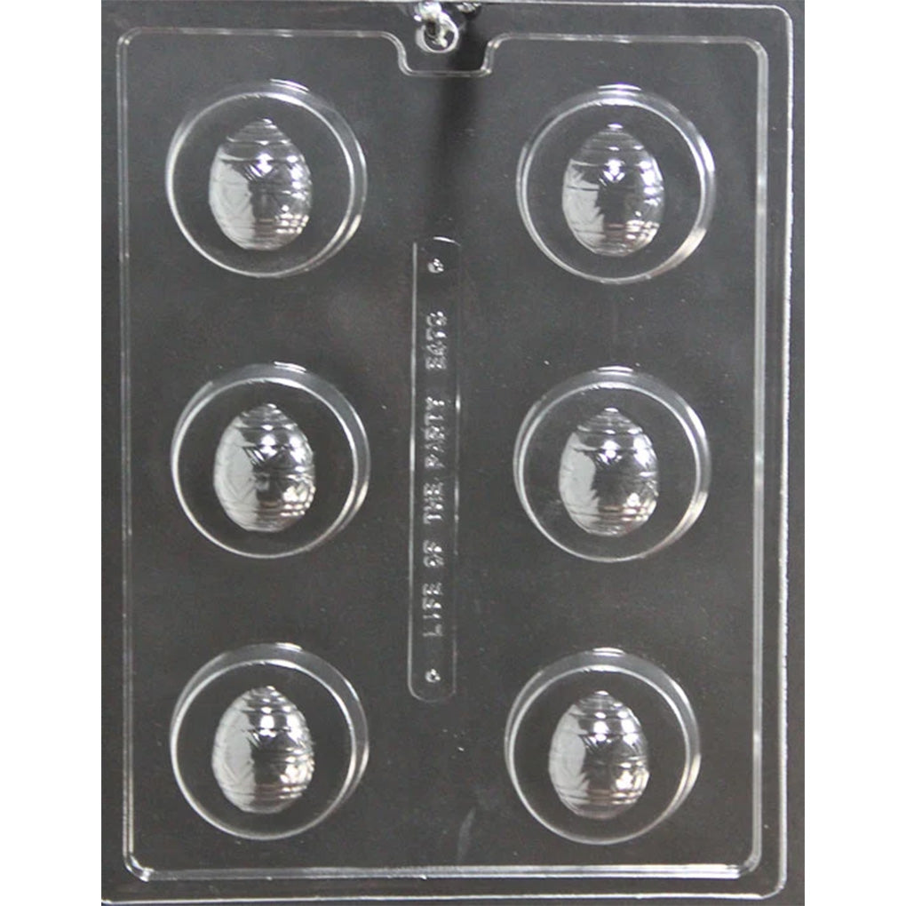 Six-cavity Easter egg chocolate-covered Oreo cookie mold with round 2 1/4-inch cavities, 3/4-inch depth, and a raised decorated egg centered on each cookie.