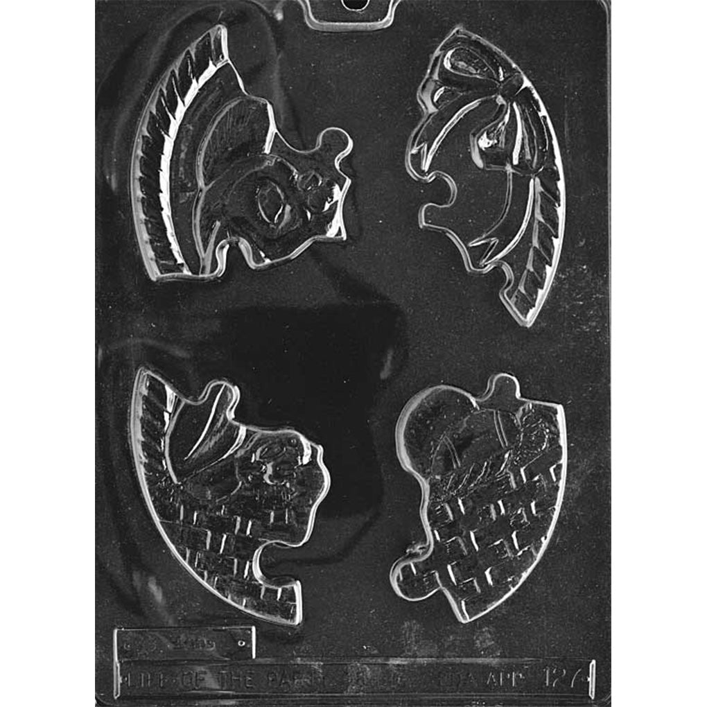 Four-cavity Easter egg puzzle chocolate mold with interlocking decorated pieces featuring raised ribbon and basket-weave accents; assembled egg measures 4 x 2 3/8 x 3/8 inches.
