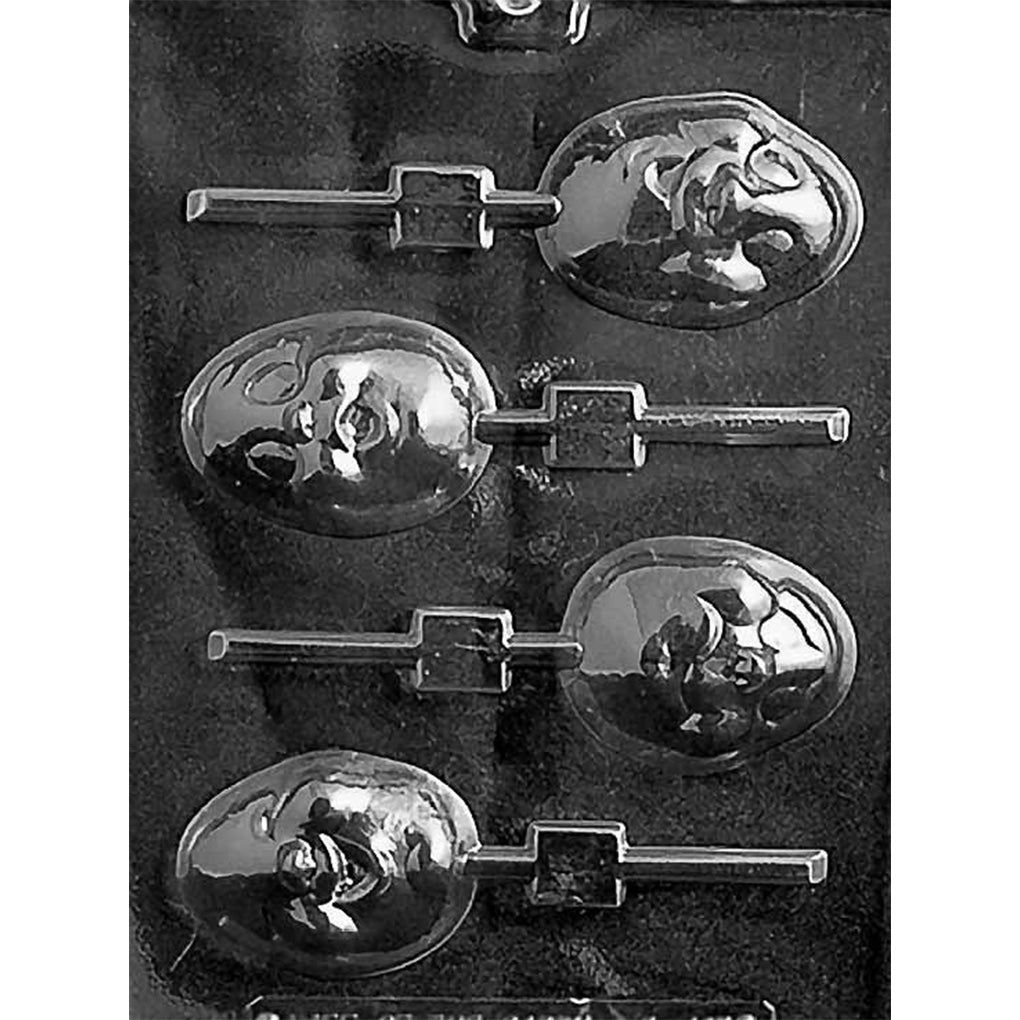 Four-cavity Egg Head chocolate lollipop mold with egg-shaped cartoon faces and alternating stick channels, each measuring 2 5/8 x 2 x 5/8 inches deep.