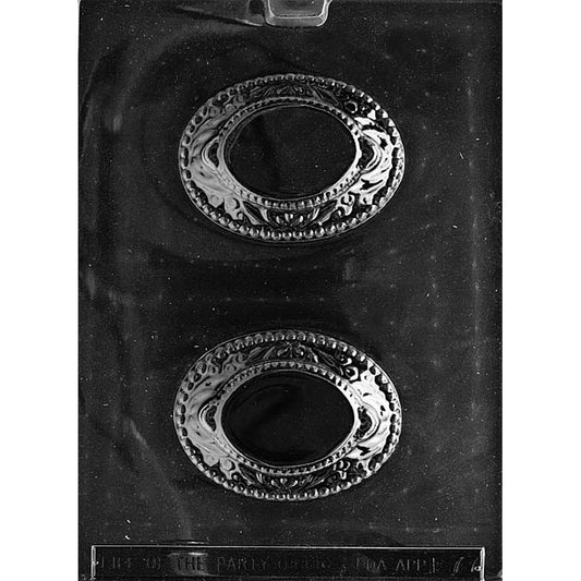 Egg holder chocolate mold with two oval, ornate cradle-shaped cavities on a dark plastic tray, featuring raised beaded edges and decorative scrollwork meant to hold a small chocolate egg.