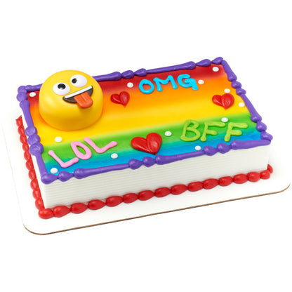 A colorful sheet cake featuring the emoji topper and fun text decorations like "LOL," "OMG," and "BFF."