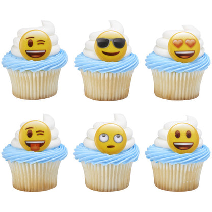 Blue and white frosted cupcakes decorated with playful emoji rings, showing a mix of facial expressions and moods.