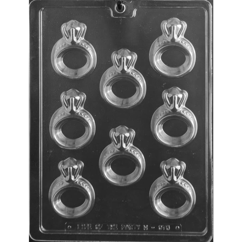 Engagement ring chocolate mold with eight open-center cavities featuring faceted stones and detailed bands, each measuring 2 x 1 5/16 x 1/2 inch deep